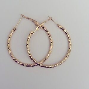 Twisted Wavy Gold Toned Hoop Earrings
